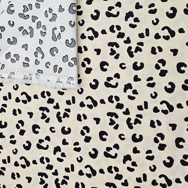 Babycord Leoprint naturweiß